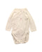 A White Long Sleeve Bodysuits from Petit Bateau in size 0-3M for girl. (Front View)
