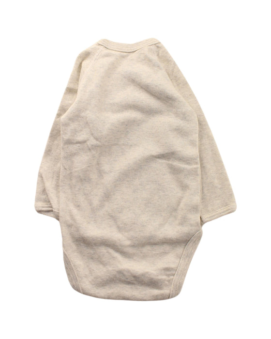 A Beige Long Sleeve Bodysuits from Petit Bateau in size 3-6M for neutral. (Back View)