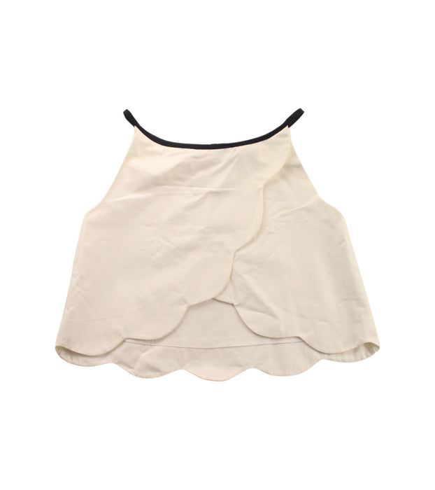 A Beige Sleeveless Tops from Jacadi in size 5T for girl. (Back View)