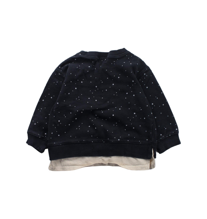 A Blue Crewneck Sweatshirts from Petit Main in size 2T for girl. (Back View)