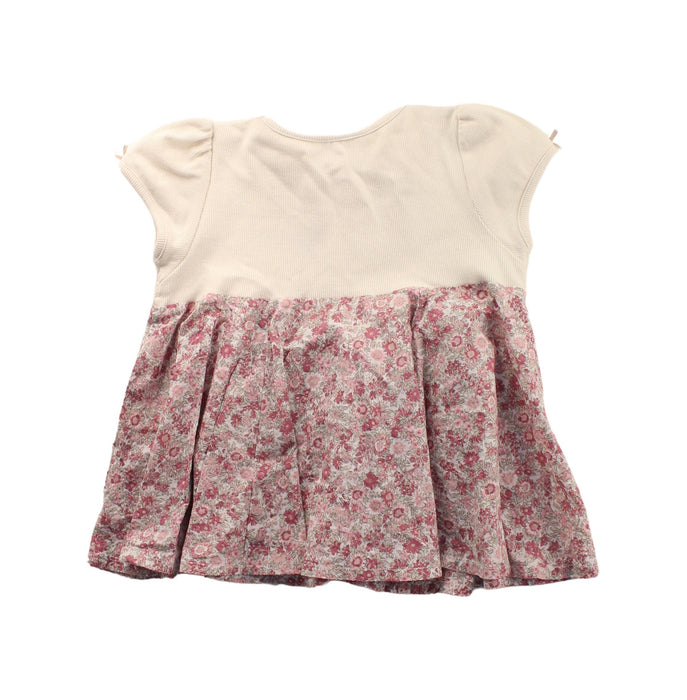 A Pink Short Sleeve Dresses from Petit Main in size 2T for girl. (Back View)