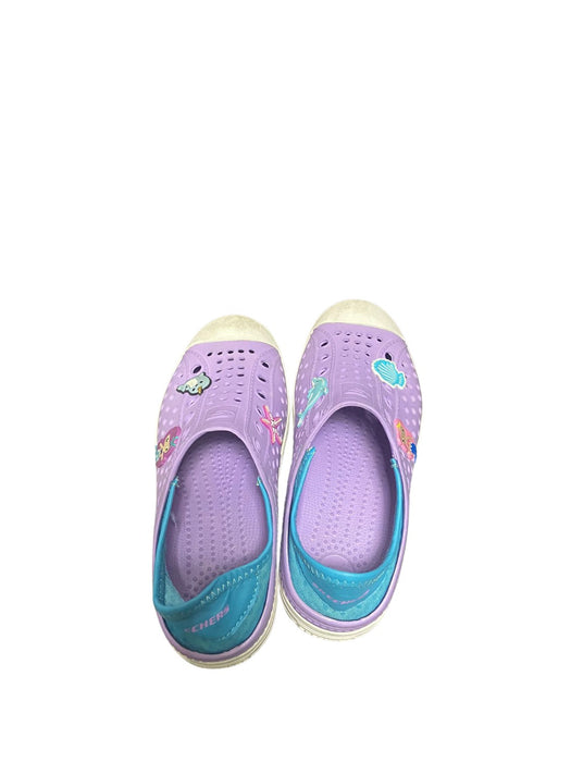 A Purple Aqua Shoes from Skechers in size 7Y for girl. (Front View)