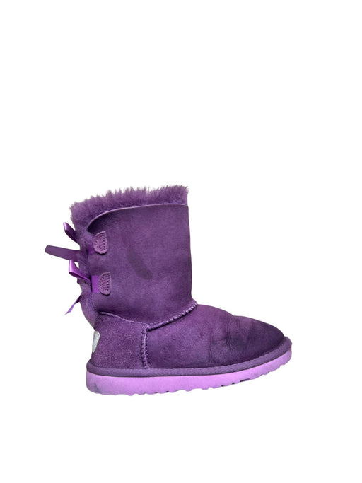 A Purple Winter Boots from UGG in size 5T for girl. (Front View)