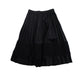 A Black Mid Skirts from Rococo in size 7Y for girl. (Back View)