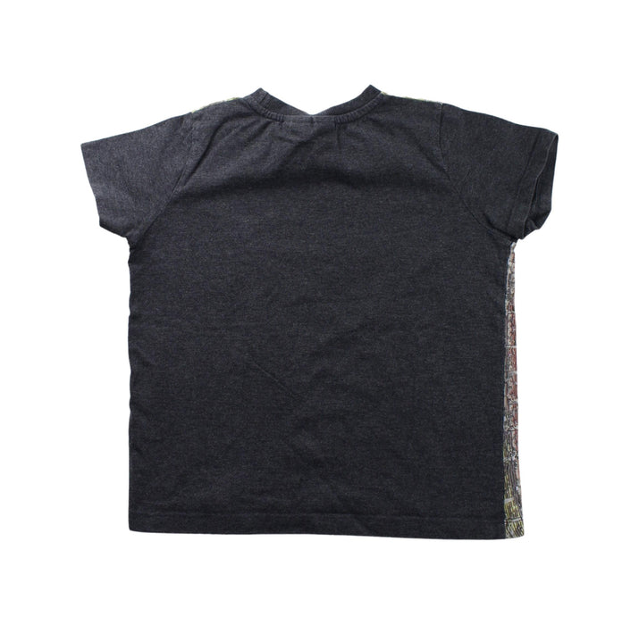 A Black Short Sleeve T Shirts from Molo in size 6T for boy. (Back View)