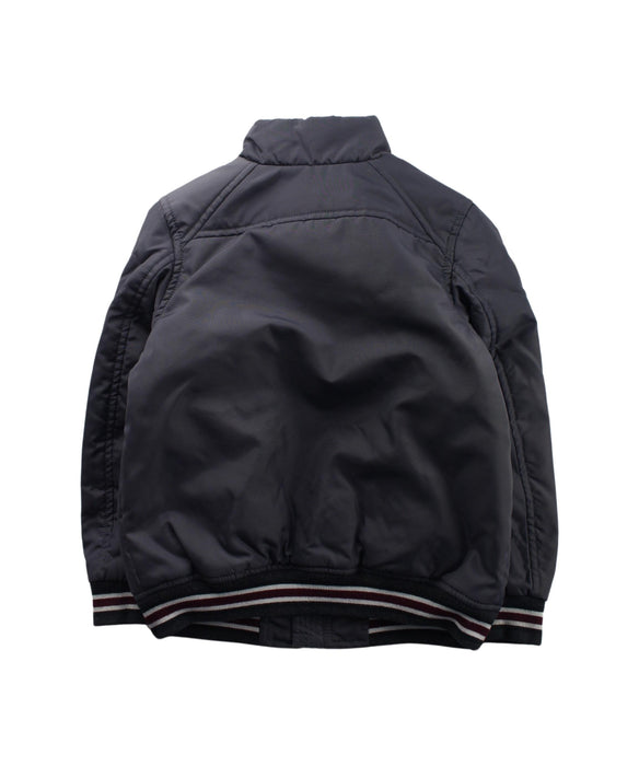 A Grey Lightweight Jackets from Catimini in size 4T for boy. (Back View)