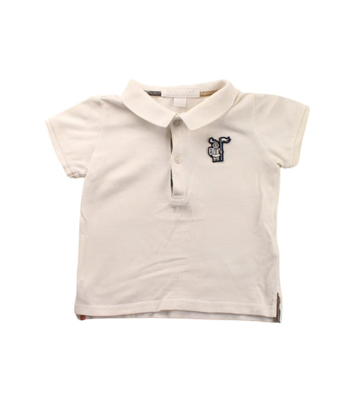 A White Short Sleeve Polos from Burberry in size 6-12M for boy. (Front View)