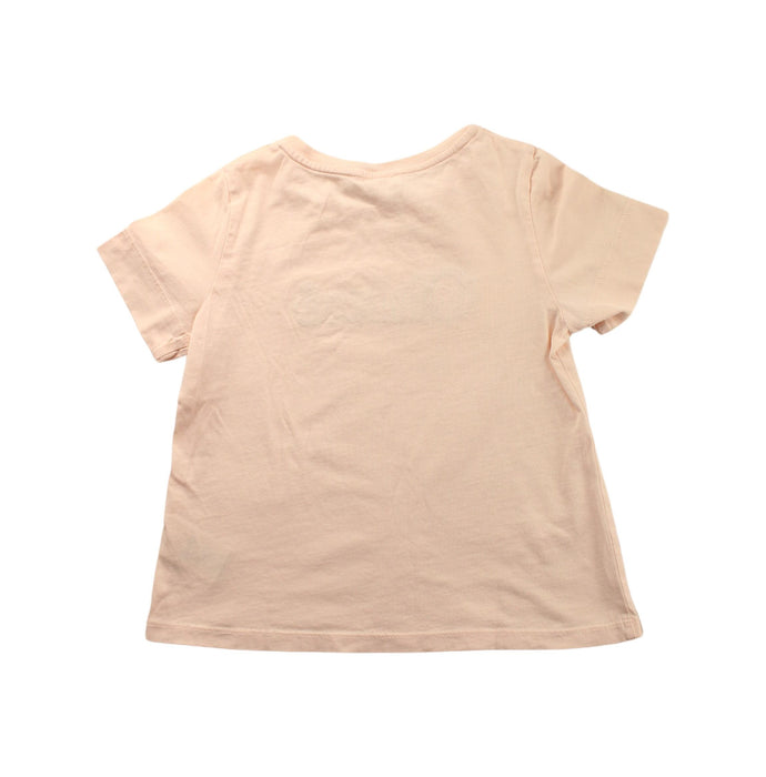 A Beige Short Sleeve T Shirts from Chloe in size 5T for girl. (Back View)