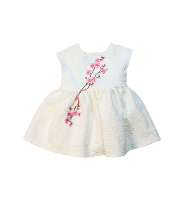 A White Sleeveless Dresses from Pippa & Julie in size 6-12M for girl. (Front View)