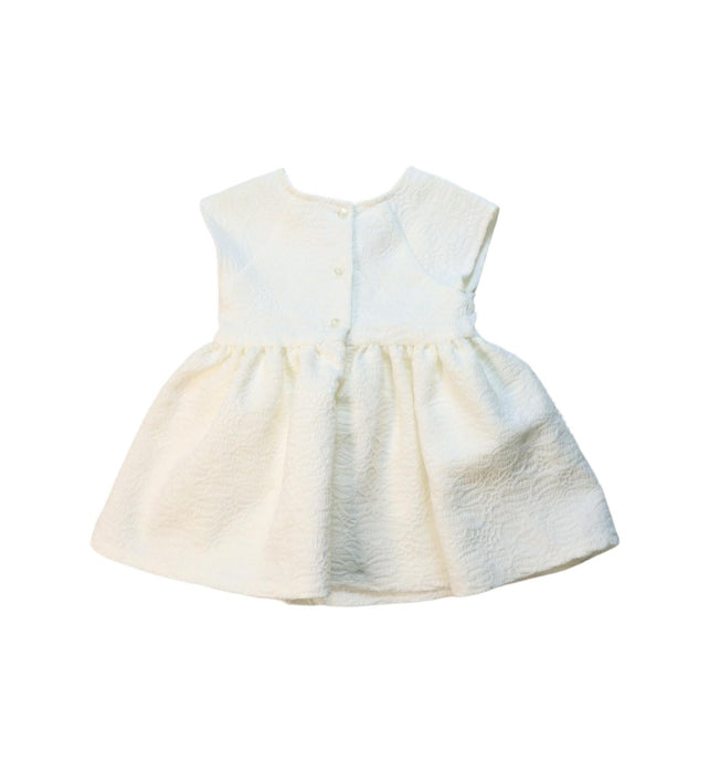 A White Sleeveless Dresses from Pippa & Julie in size 6-12M for girl. (Back View)