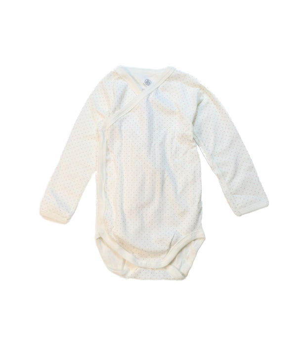 A White Long Sleeve Bodysuits from Petit Bateau in size 6-12M for neutral. (Front View)