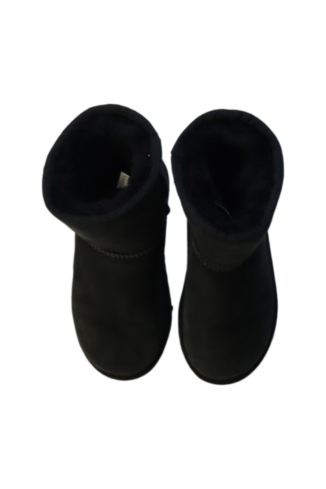 A Black Winter Boots from UGG in size 6T for girl. (Back View)