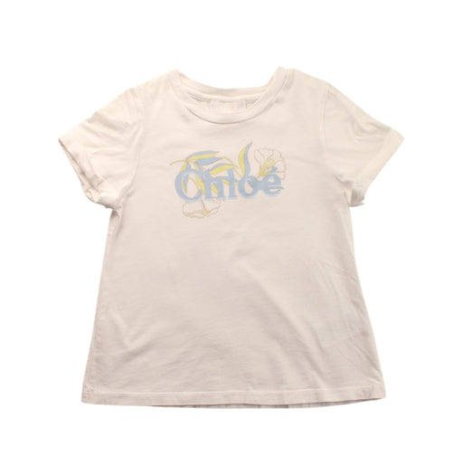 A White Short Sleeve T Shirts from Chloe in size 5T for girl. (Front View)