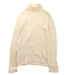 A Ivory Long Sleeve Tops from Familiar in size 7Y for girl. (Front View)