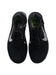 A Black Sneakers from Nike in size 12Y for boy. (Back View)