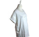 A White Short Sleeve T Shirts from Seraphine in size M for maternity. (Front View)