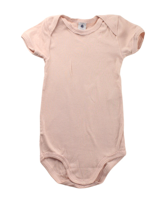 A Pink Short Sleeve Bodysuits from Petit Bateau in size 2T for girl. (Front View)