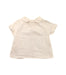 A White Short Sleeve Tops from Nanos in size 6-12M for girl. (Front View)