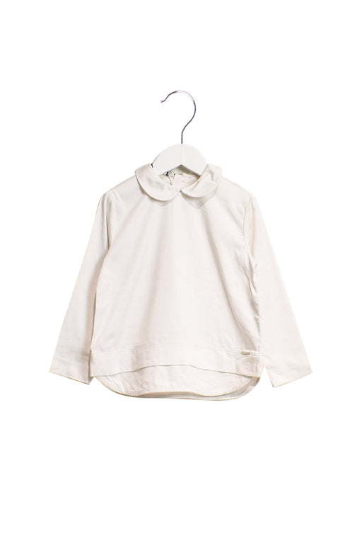 A White Long Sleeve Tops from Diesel in size 4T for girl. (Front View)