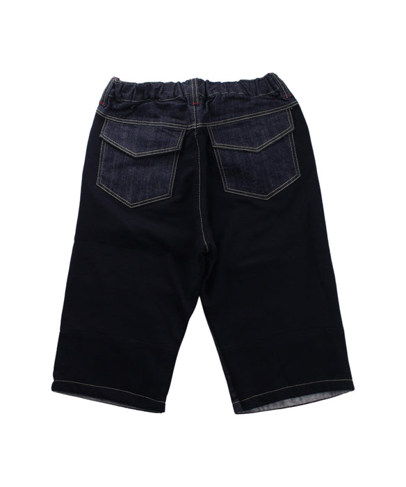 A Blue Shorts from Comme Ca Ism in size 7Y for boy. (Back View)