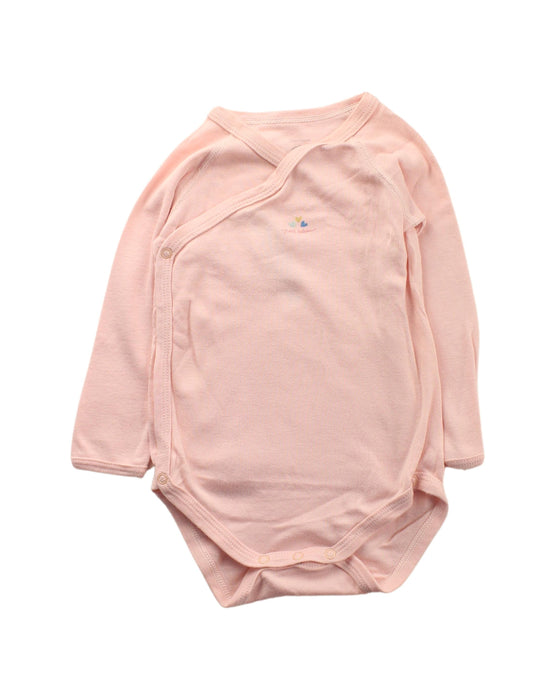 A Pink Long Sleeve Bodysuits from Petit Bateau in size 6-12M for girl. (Front View)