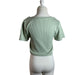 A Green Short Sleeve Tops from Mamalicious in size L for maternity. (Back View)