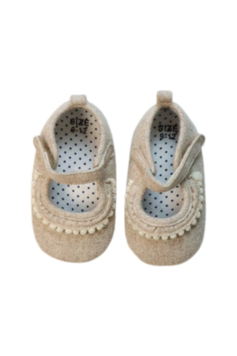 A Beige Flats from Minimoc in size 6-12M for girl. (Back View)