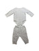A White Pyjama Sets from Mides in size 6-12M for neutral. (Front View)