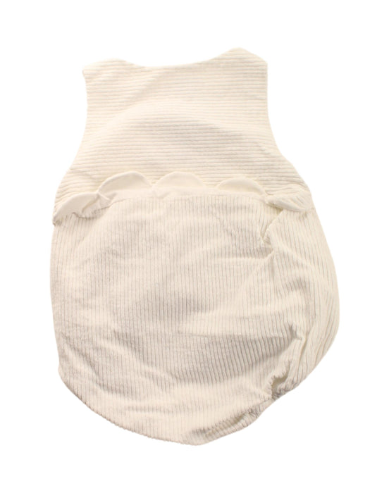 A White Overall Shorts from Jacadi in size 3-6M for girl. (Back View)