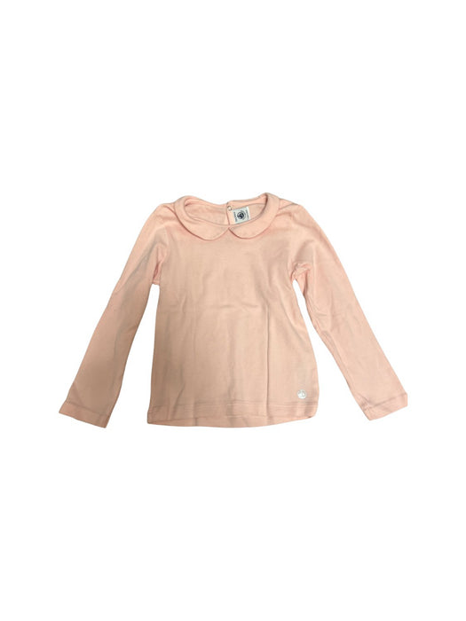 A Peach Long Sleeve Tops from Petit Bateau in size 5T for girl. (Front View)