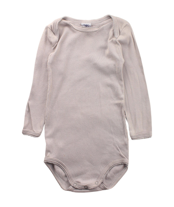 A Beige Long Sleeve Bodysuits from Petit Bateau in size 12-18M for girl. (Front View)