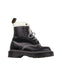 A Black Casual Boots from Dr. Martens in size 11Y for boy. (Front View)