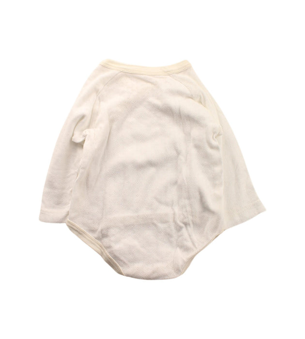 A White Long Sleeve Bodysuits from Natures Purest in size 3-6M for girl. (Back View)