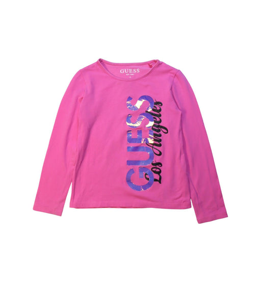 A Pink Long Sleeve T Shirts from Guess in size 5T for girl. (Front View)