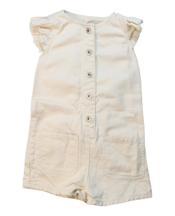 A Ivory Short Sleeve Rompers from Seed in size 5T for girl. (Front View)