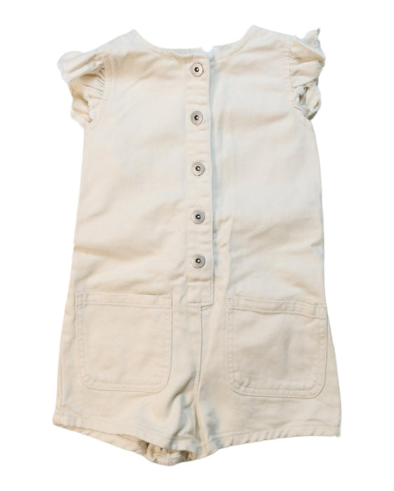 A Ivory Short Sleeve Rompers from Seed in size 4T for girl. (Front View)