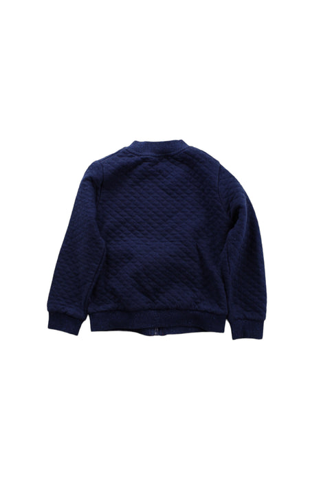 A Blue Zippered Sweatshirts from La Compagnie des Petits in size 5T for boy. (Back View)