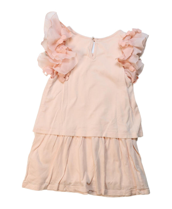 A Pink Sleeveless Dresses from Chloe in size 5T for girl. (Back View)