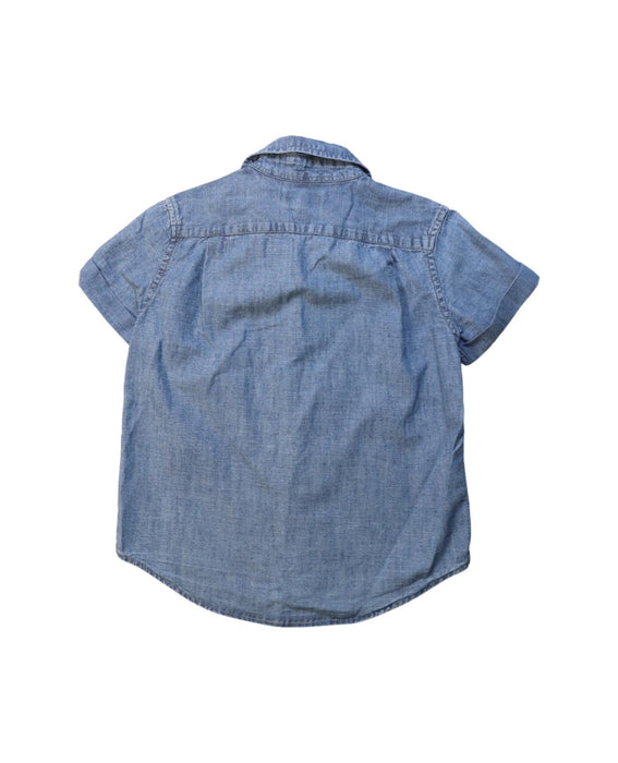 A Blue Short Sleeve Shirts from Jacadi in size 5T for boy. (Back View)