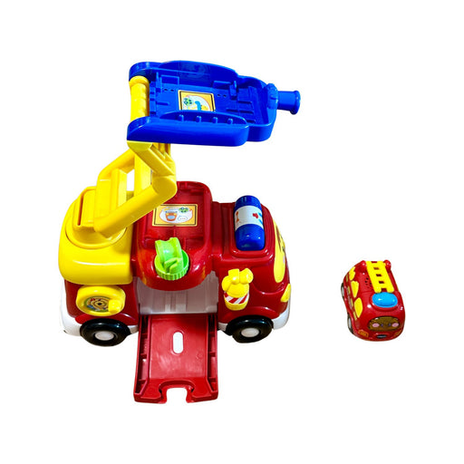 A Red Cars Trucks Trains & Remote Control from Vtech in size O/S for neutral. (Back View)