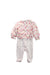 A White Onesies from Dior in size 3-6M for girl. (Back View)