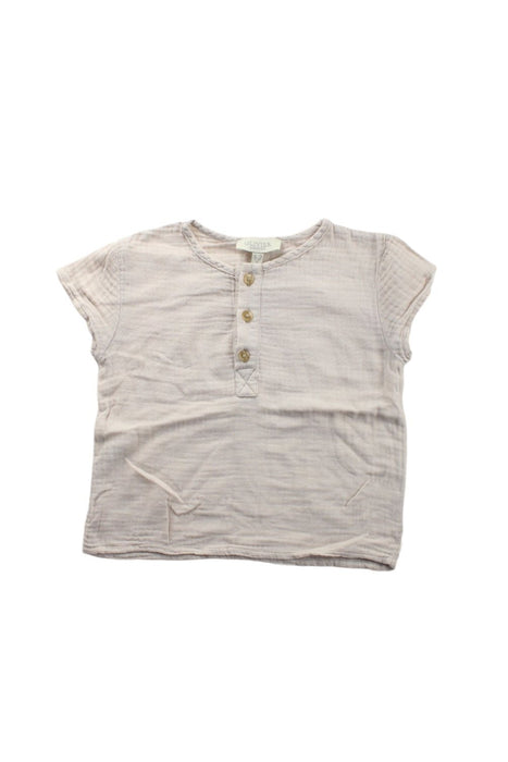 A Beige Short Sleeve Tops from Olivier London in size 2T for girl. (Front View)