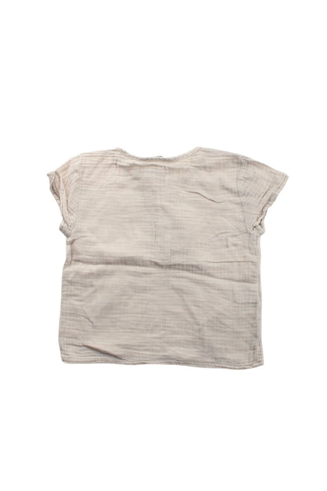 A Beige Short Sleeve Tops from Olivier London in size 2T for girl. (Back View)