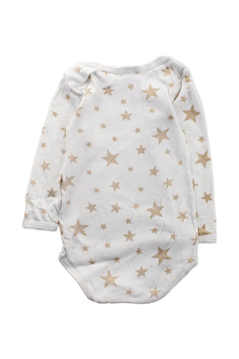 A White Long Sleeve Bodysuits from Petit Bateau in size 12-18M for girl. (Back View)