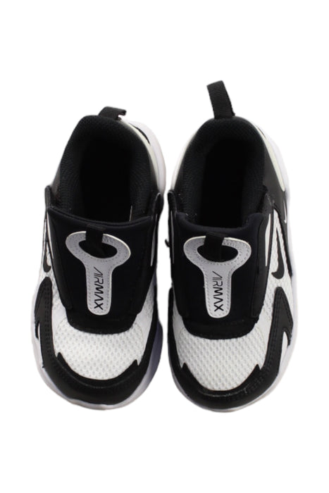 A Black Sneakers from Nike in size 4T for boy. (Back View)
