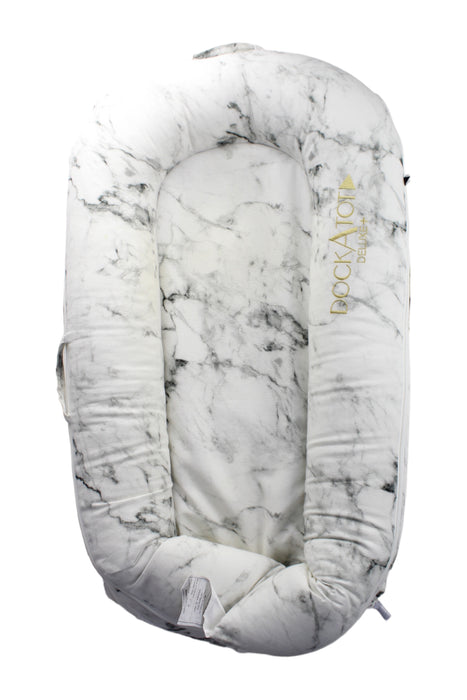 A White Cots & Cribs from DockATot in size O/S for neutral. (Front View)