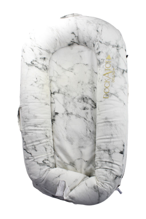 A White Cots & Cribs from DockATot in size O/S for neutral. (Front View)