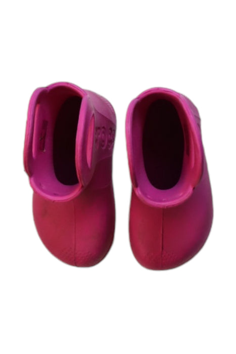 A Pink Rain Boots from Crocs in size 18-24M for girl. (Back View)