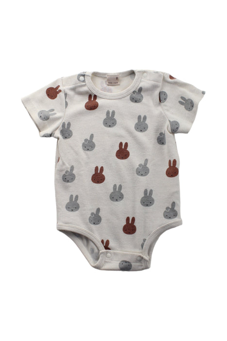 A White Short Sleeve Bodysuits from Petit Main in size 12-18M for boy. (Front View)