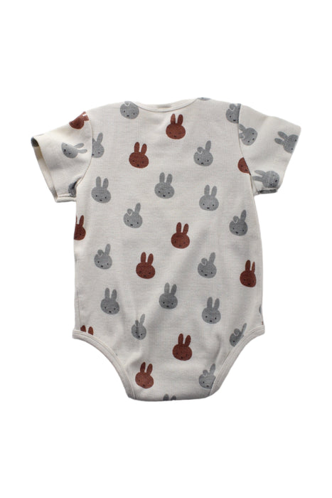 A White Short Sleeve Bodysuits from Petit Main in size 12-18M for boy. (Back View)